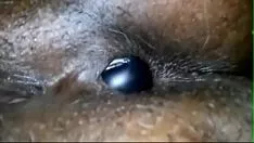 Play Ebony tree orifice dildoing